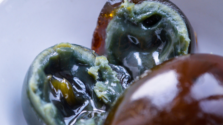Blackened century eggs