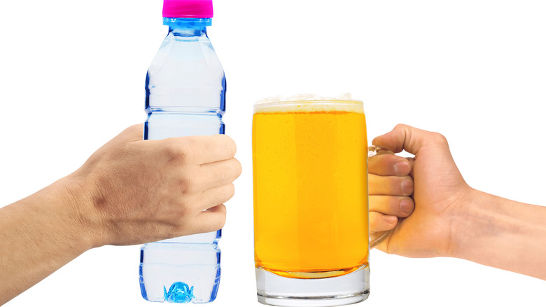 Beer glass and water bottle