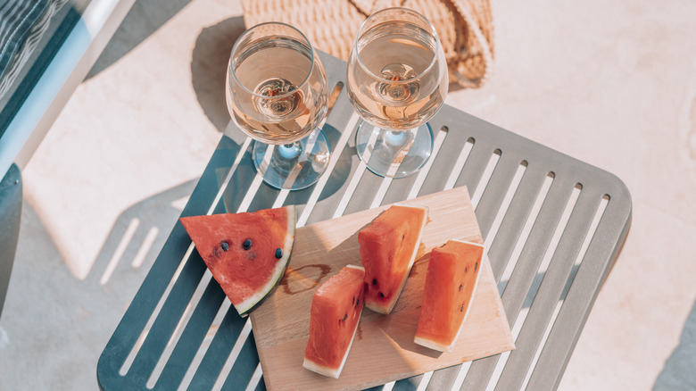 watermelon slices with wine glasses 