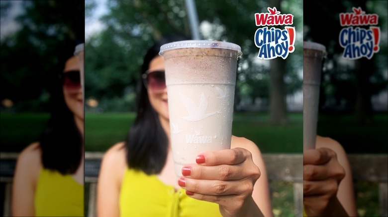 Woman holding Wawa Chips Ahoy milkshake