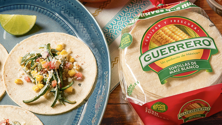 package of Guerrero tortillas next to plate of food