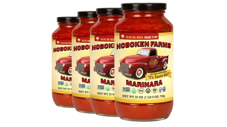Four jars of Hoboken Farms marinara sauce on a white background