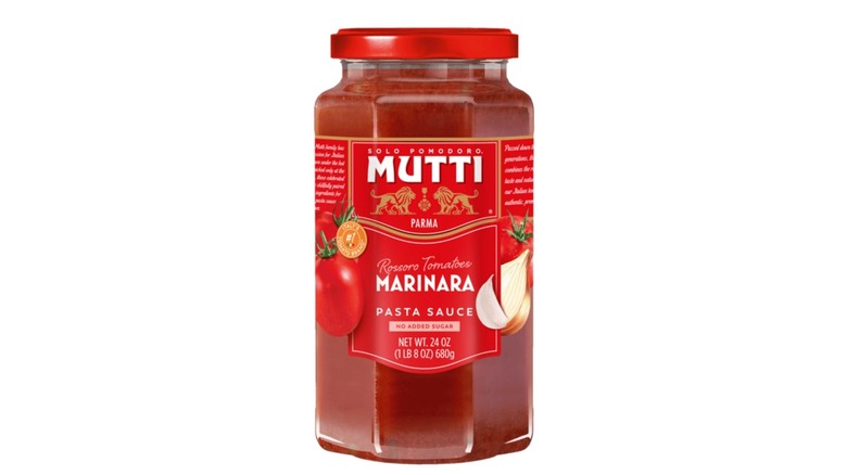 Jar of Mutti marinara sauce on a white background