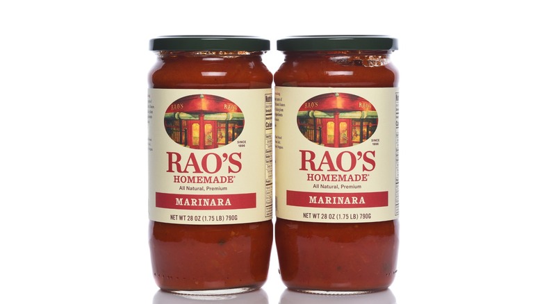 Two jars of Rao's homemade marinara sauce on white background