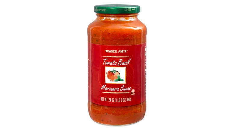 Jar of Trader Joe's tomato basil tomato sauce on white background