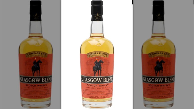 Bottle of Compass Box Glasgow Blend next to whiskey glass
