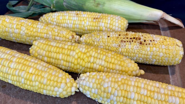 Ears of corn cooked in various ways