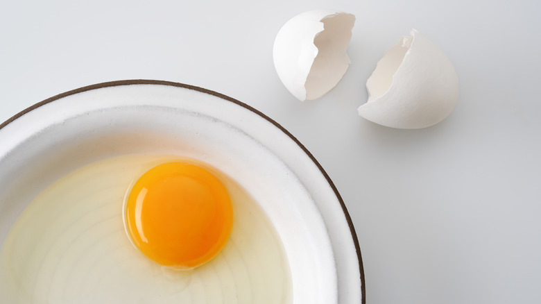 cracked egg in a bowl