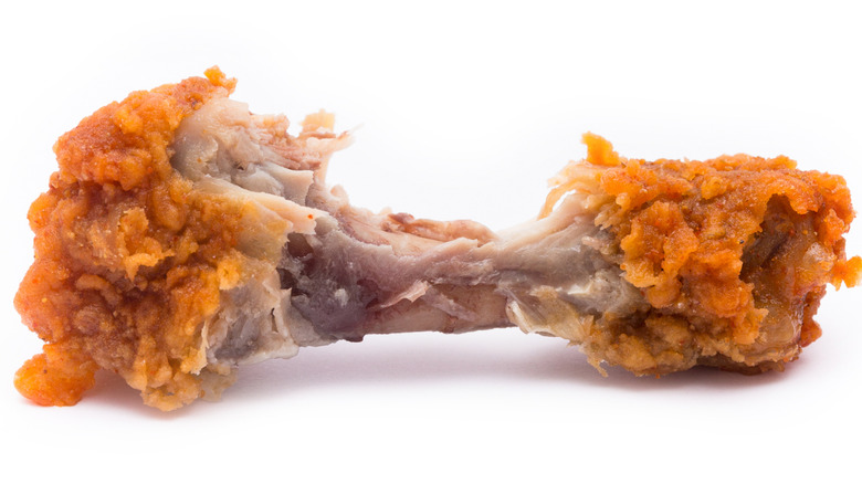 Meat picked off from a fried chicken bone