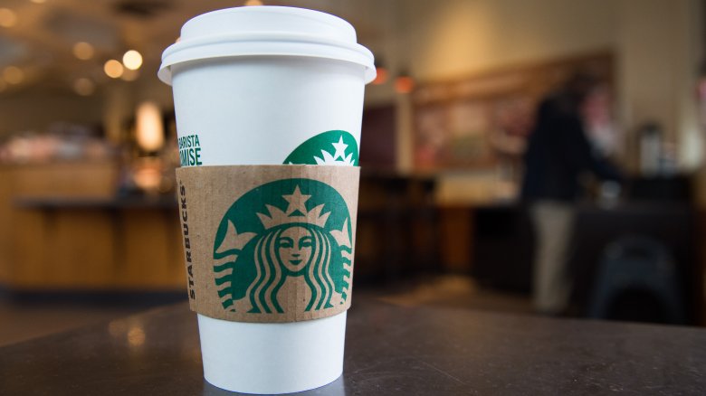 You've been using Starbucks lids all wrong and the right way stops messy  spills