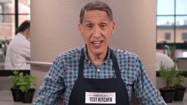 Jack Bishop wearing an apron on America's Test Kitchen