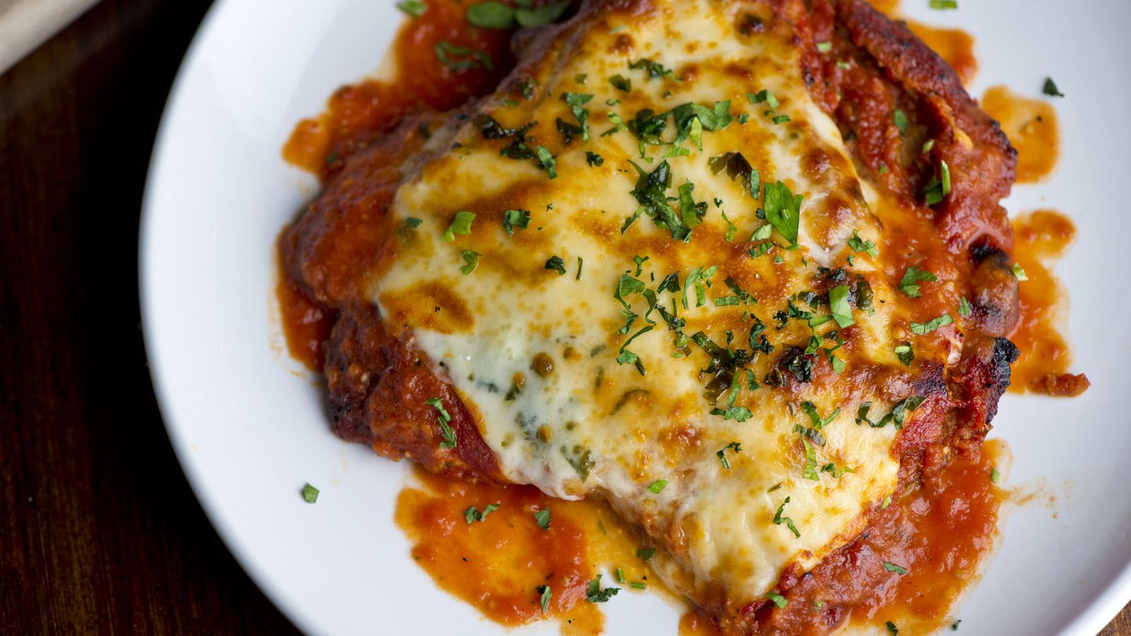 We Spoke To Chefs To Find Out Why Chicken Parmesan Always Tastes Better At A Restaurant