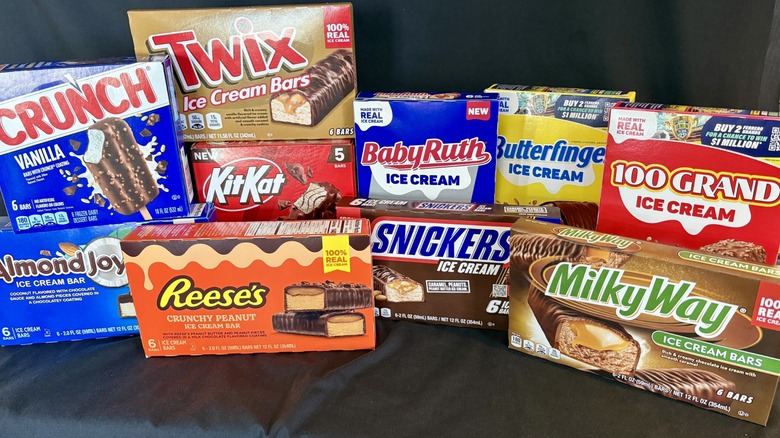 Boxes of assorted candy-brand ice cream bars.