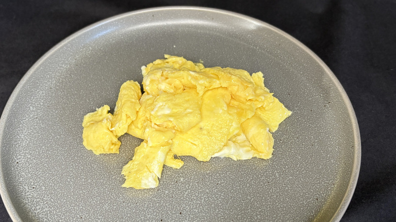scrambled eggs on gray plate