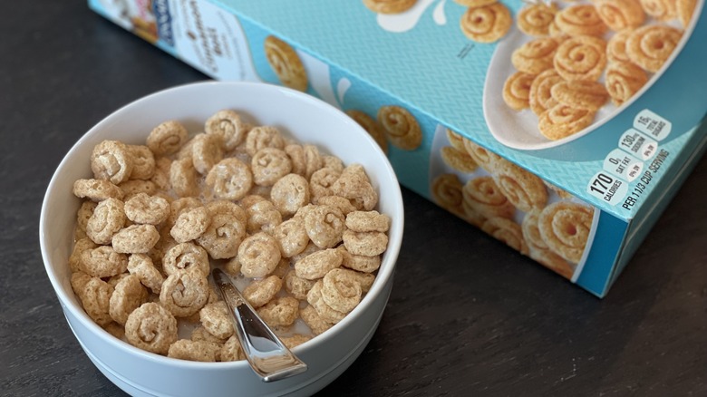 a bowl of cereal with a box