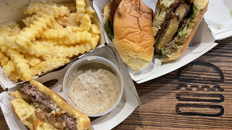 assorted Shake Shack burgers fries