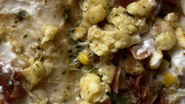 Close-up view of Dunkin' Breakfast Taco filling