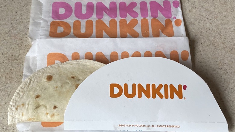 Dunkin' Breakfast Taco half-displayed on wrapper