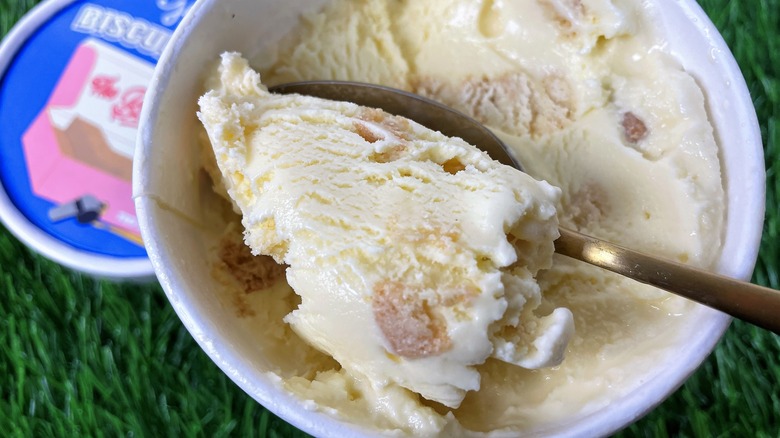 A spoon in a pint of Jeni's Biscuits with the Boss Ice Cream