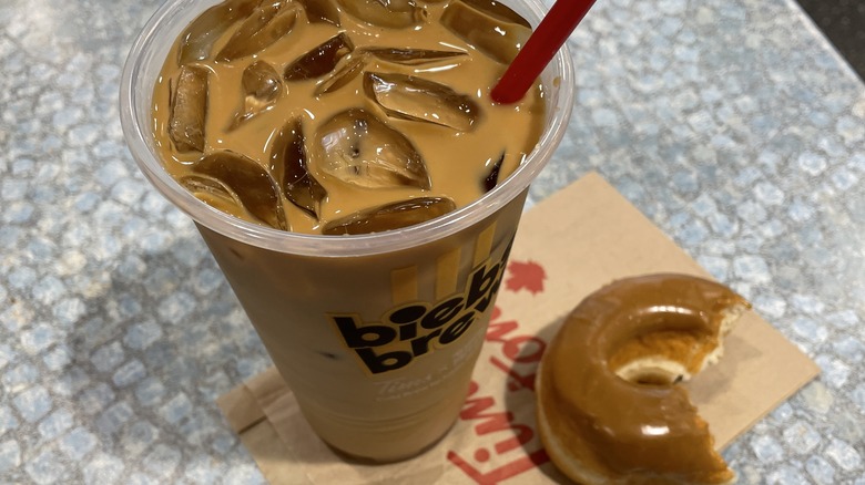 A large iced Biebs Brew and maple doughnut from Tim Hortons