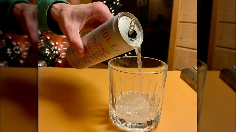 hand pouring volley seltzer