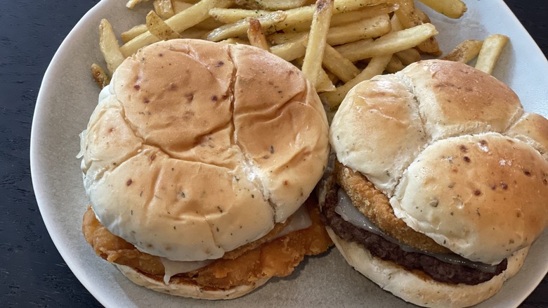 a pair of burgers and fries