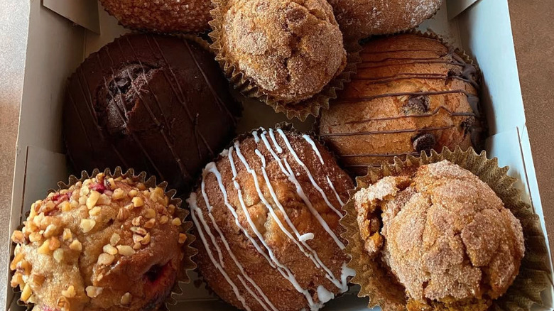 Closeup of assorted Wegmans muffins in a box