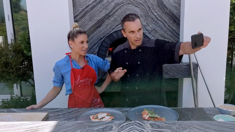 Sebastian Maniscalco taking selfie with food