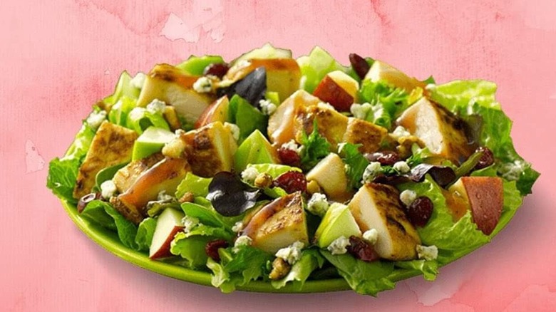 Wendy's Apple Pecan Salad on pink background