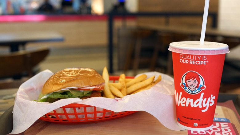 Wendy's sandwich and drink setting on a table