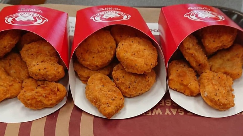 three boxes of Wendy's spicy chicken nuggets