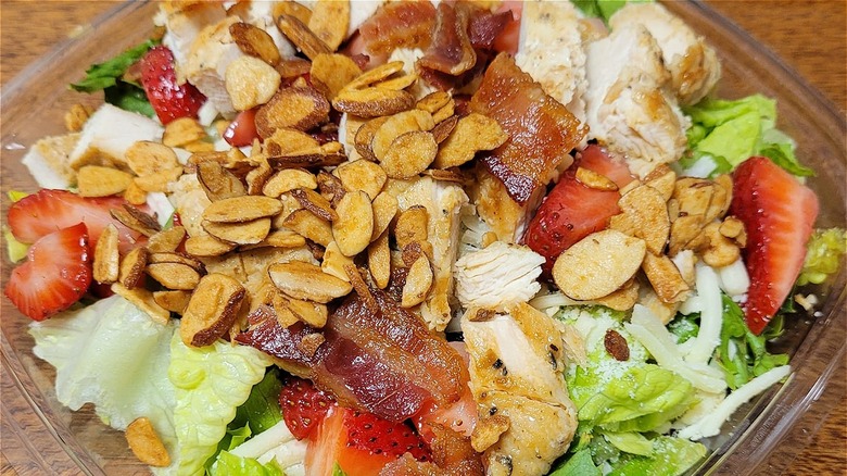 a close up of a wendys summer salad