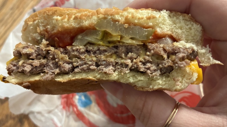 Close-up of a Wendy's Double Stack cut in half