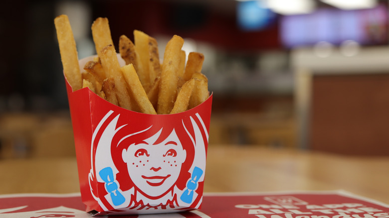 A small order of Wendy's fries sit on a table