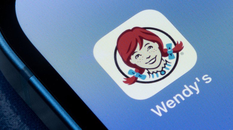 Wendy's logo on a smartphone screen