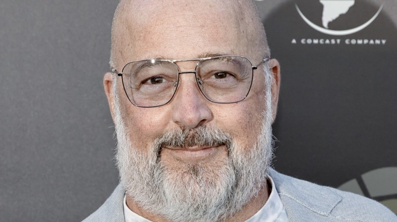 Andrew Zimmern wearing glasses