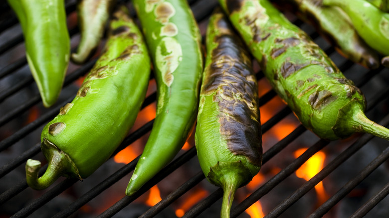 Peppers cooking on a grill