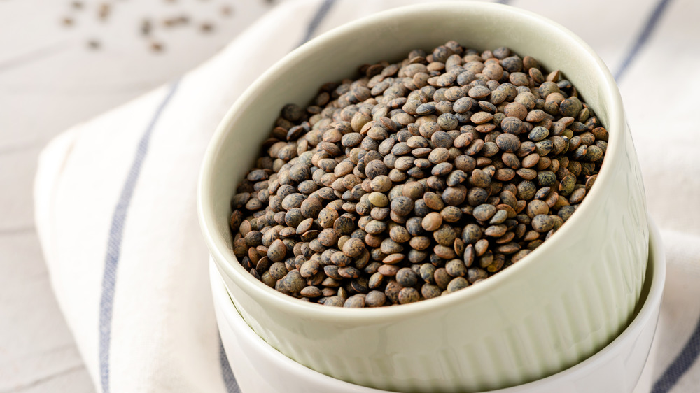 French lentils in a white serving bowl