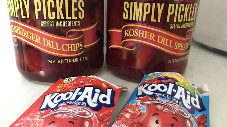 Kool-Aid Pickles next to Kool-Aid packets