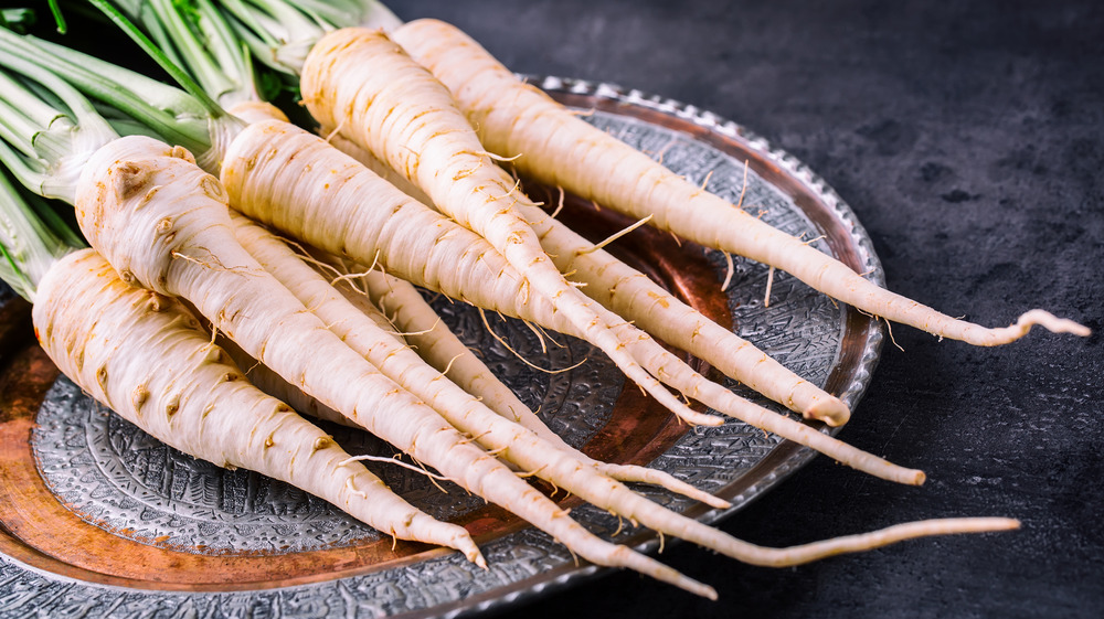 Whole parsnips on a plate