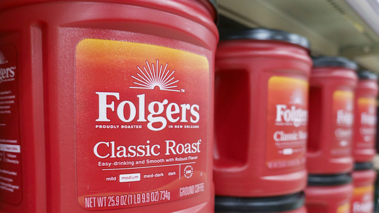 Folgers classic roast in large containers at store.