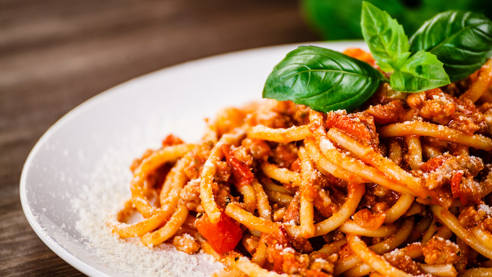 Tomato spaghetti with parmesan and basil