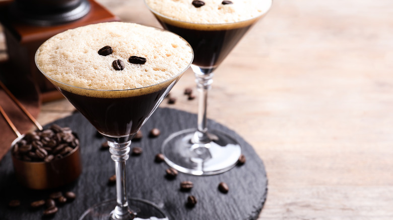 Espresso martinis on a brown tray