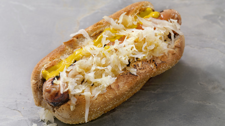 dog with mustard and sauerkraut
