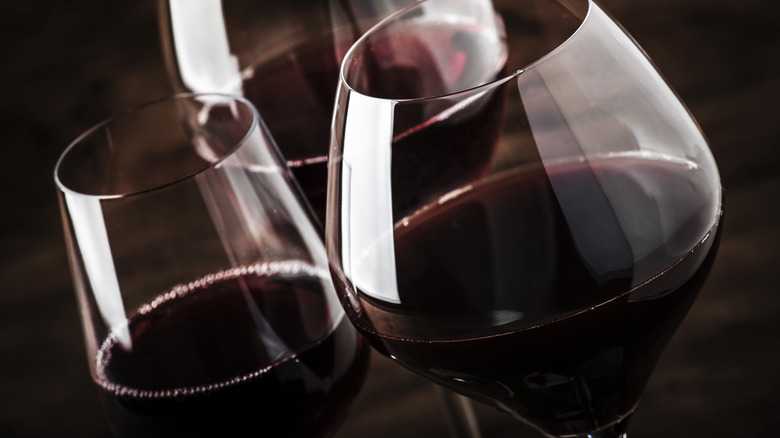 three glasses of red wine