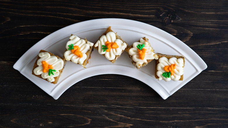 Carrot cake squares on an arc plate