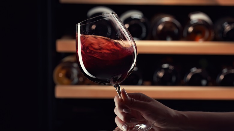 red wine glass swirling