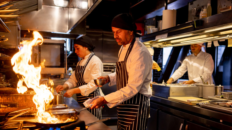 heated activity in gourmet kitchen
