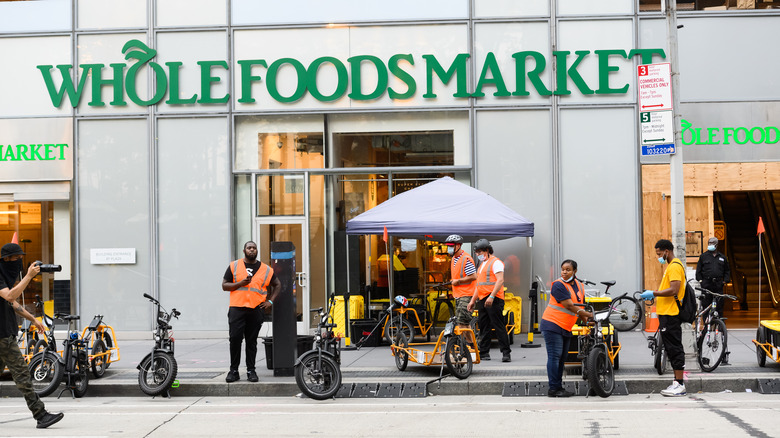 Whole Foods store with people outside