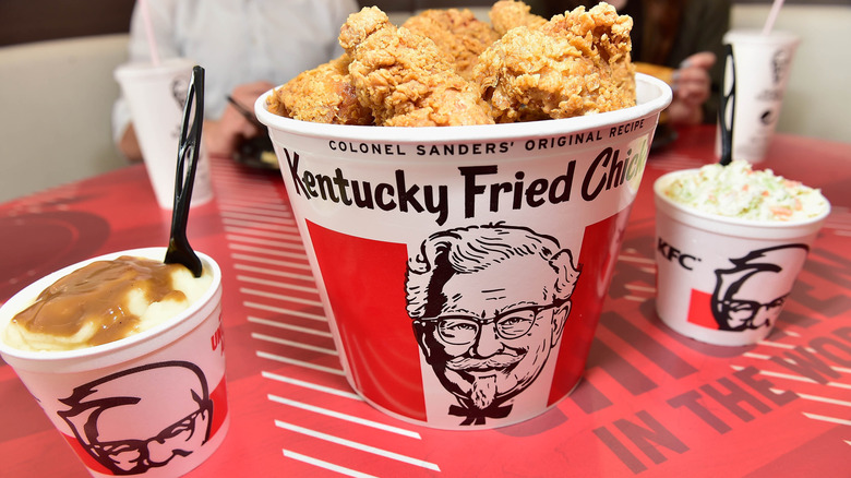 KFC bucket of fried chicken with mashed potatoes and coleslaw